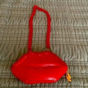 Never used Betsy Johnson red Lip Purse